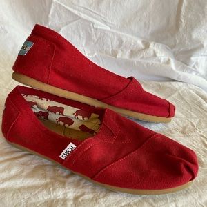 TOMS red original slip ons